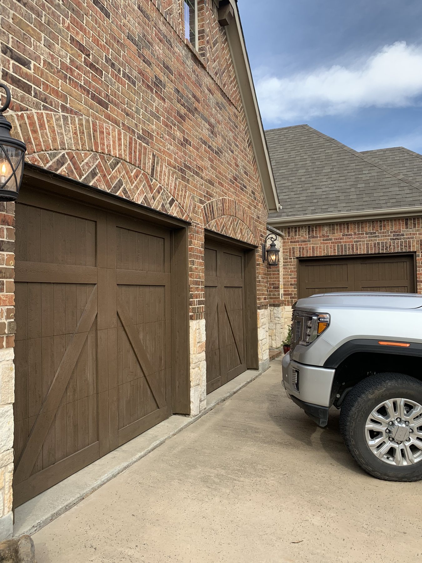 Garage doors refinished in walnut stain